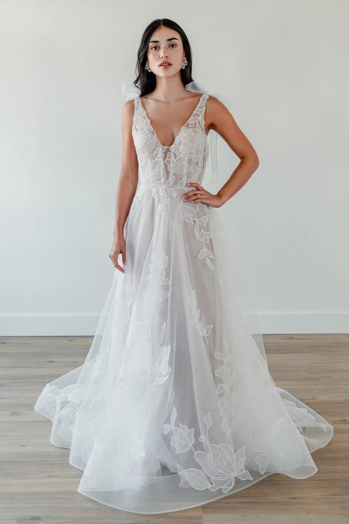 Celebrating Romance: Unveiling the Allure of A-Line Magic with Lace, Texture, and Sparkle Image