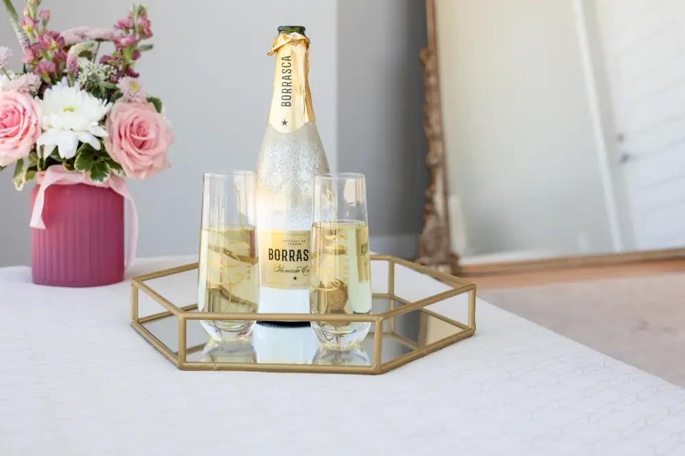 brides enjoying appointment with champagne